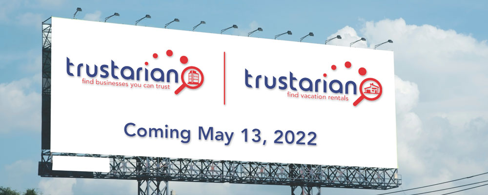 Billboard with Trustarian business and VBO logos with text Coming May 13, 2022